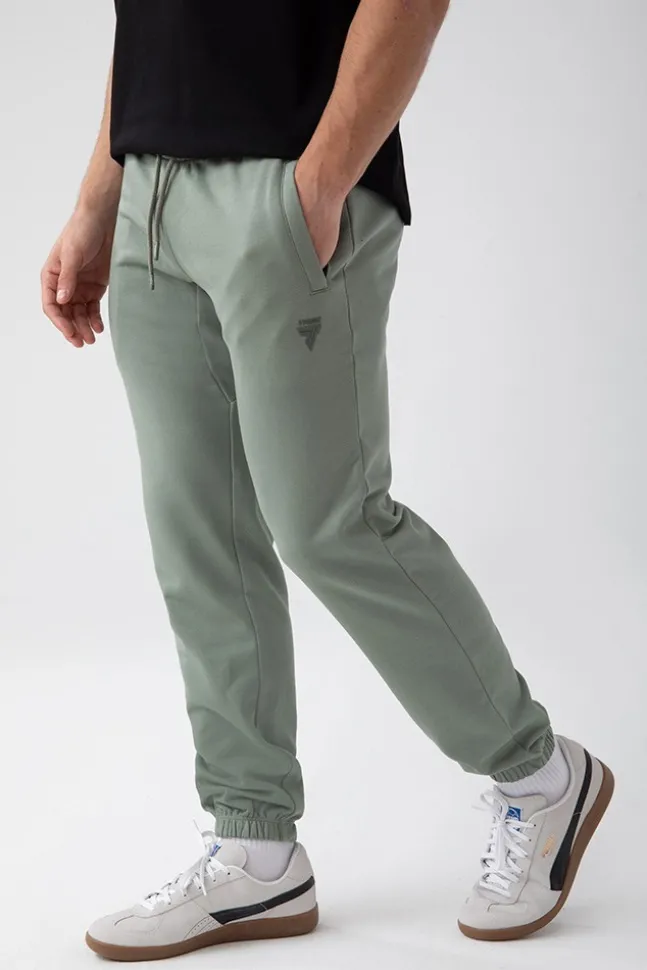 Trec Wear NOWOŚĆ Zielone spodnie dresowe męskie TW BASIC PANTS 180 M GREEN